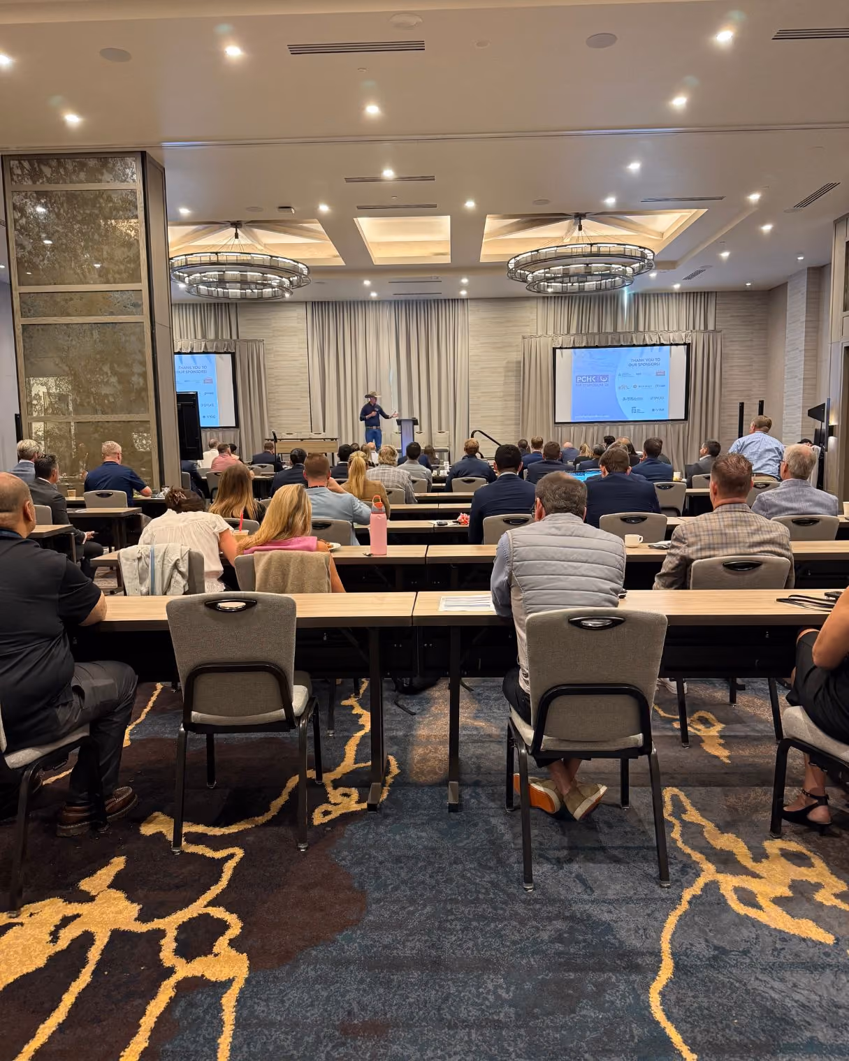 Attendees seated in the conference room at the 2026 Park City Hip & Knee Symposium